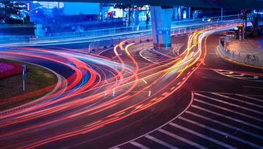 urban street with light trails in shanghai at night